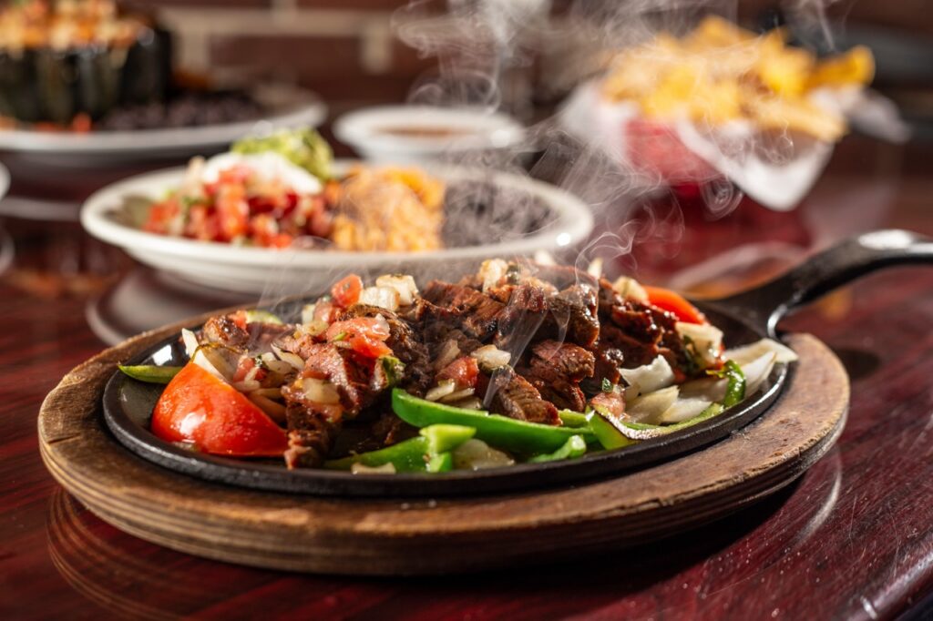 A sizzling Mexican catering spread ready for guests